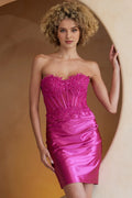 Classic white A-line homecoming dress made of glossy satin. Features V-neck, thin spaghetti straps, V-back and convenient side pockets for homecoming and semi-formal events.