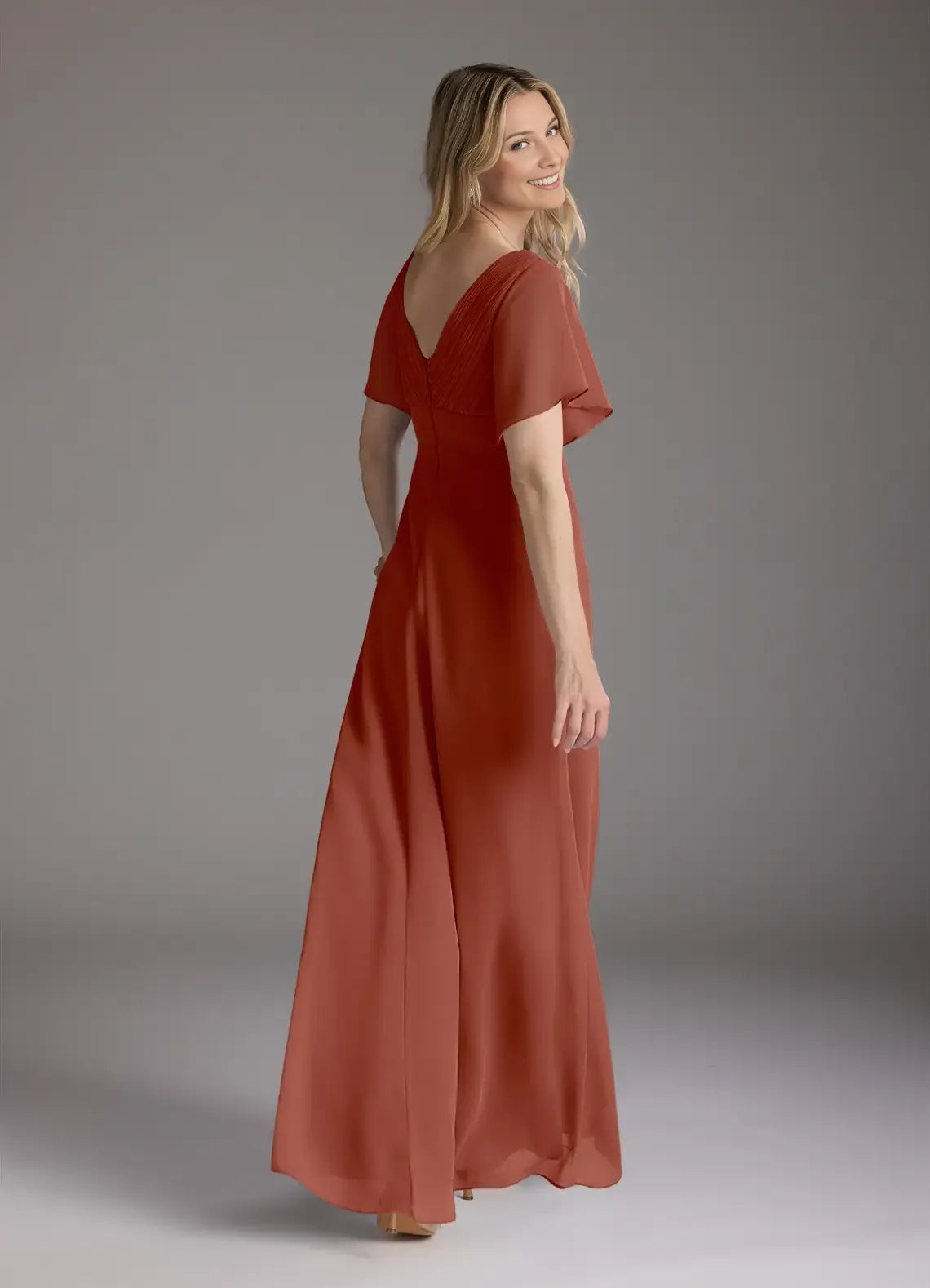 Auburn A-Line V-Neck Pleated Mother of the Bride Dress with Flutter Sleeves and Flowy Maxi Skirt