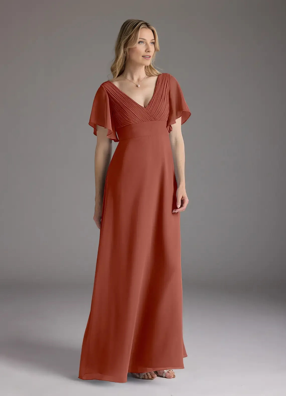 Auburn A-Line V-Neck Pleated Mother of the Bride Dress with Flutter Sleeves and Flowy Maxi Skirt