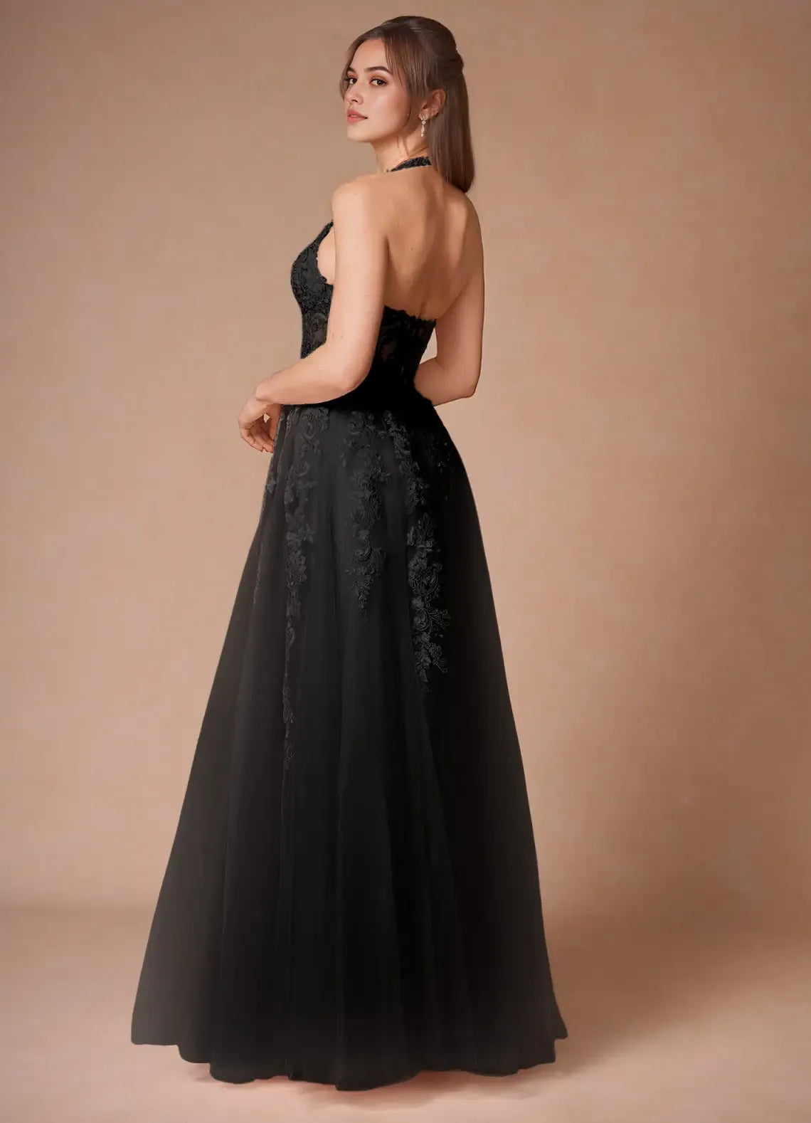 Black Halter Neck Prom Dress with Deep V - Neckline Intricate Appliqués and Flowy Skirt for Formal Galas