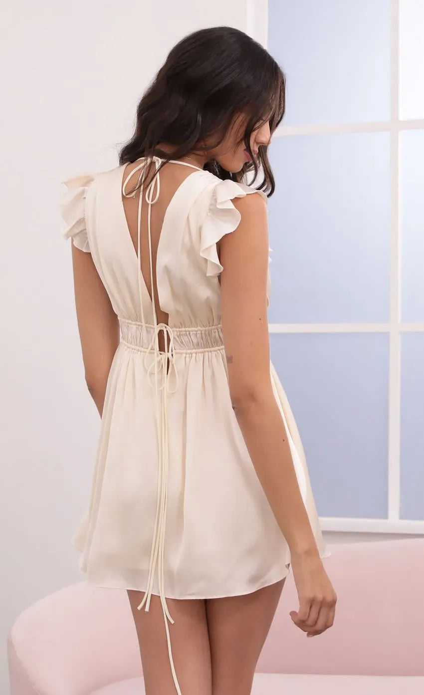 White Creamy Homecoming Dress with Deep V Neck Ruffled Sleeves Waist and Tie Up Detail Perfect for School Dances