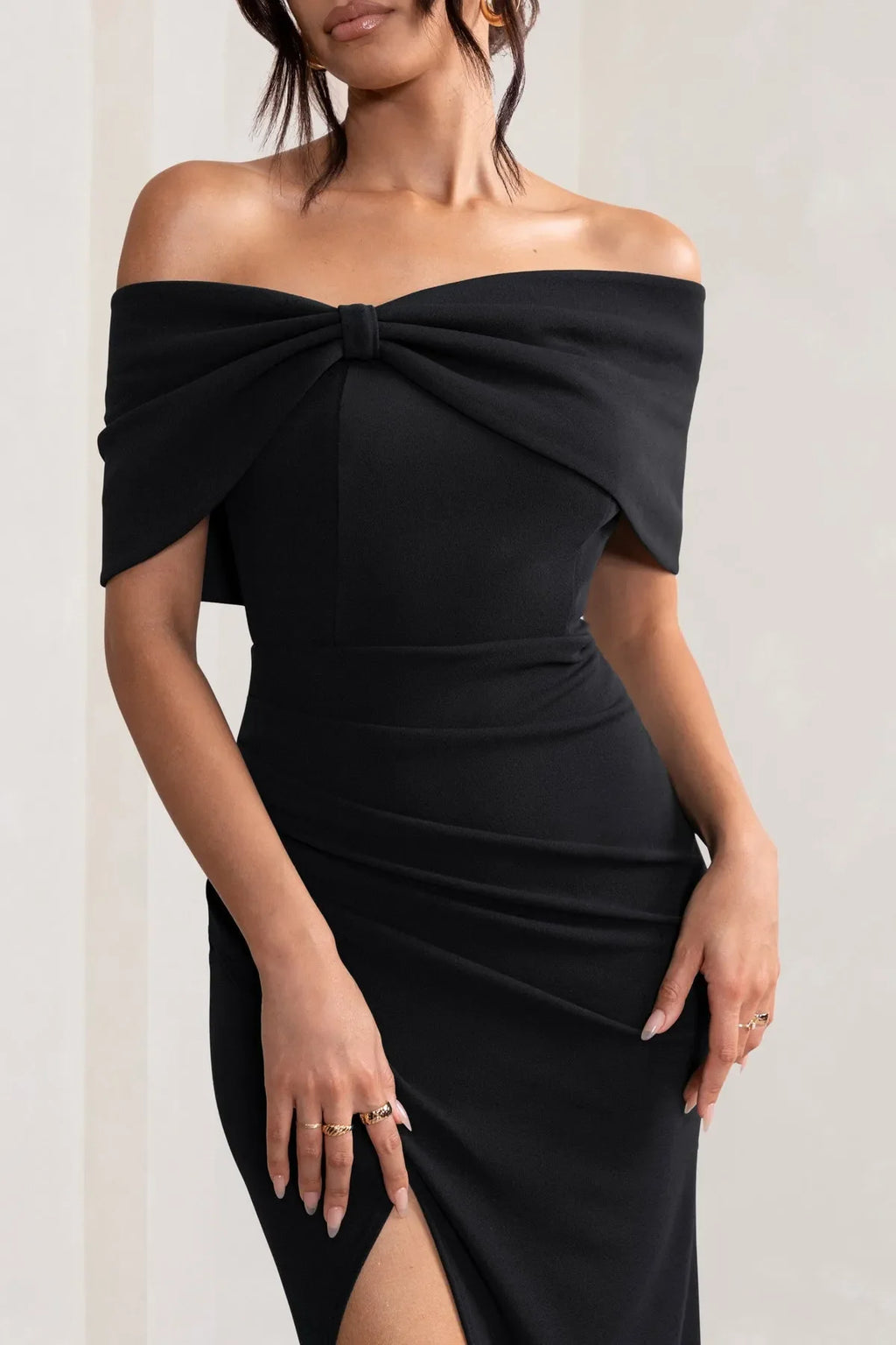 Black Off Shoulder Prom Dresses with Bow Detail Ruched Skirt and High Side Slit Perfect for Proms and Formal Galas