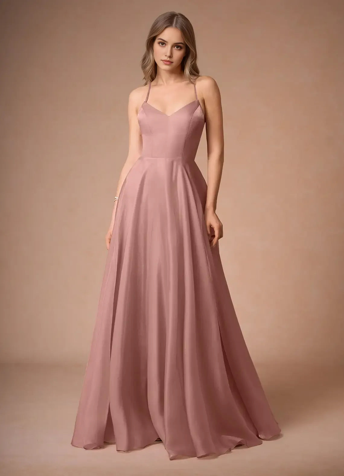 Blush Pink Prom Dress with Spaghetti Straps Sweetheart Neckline and Flowy A - Line Skirt for Formal Occasions