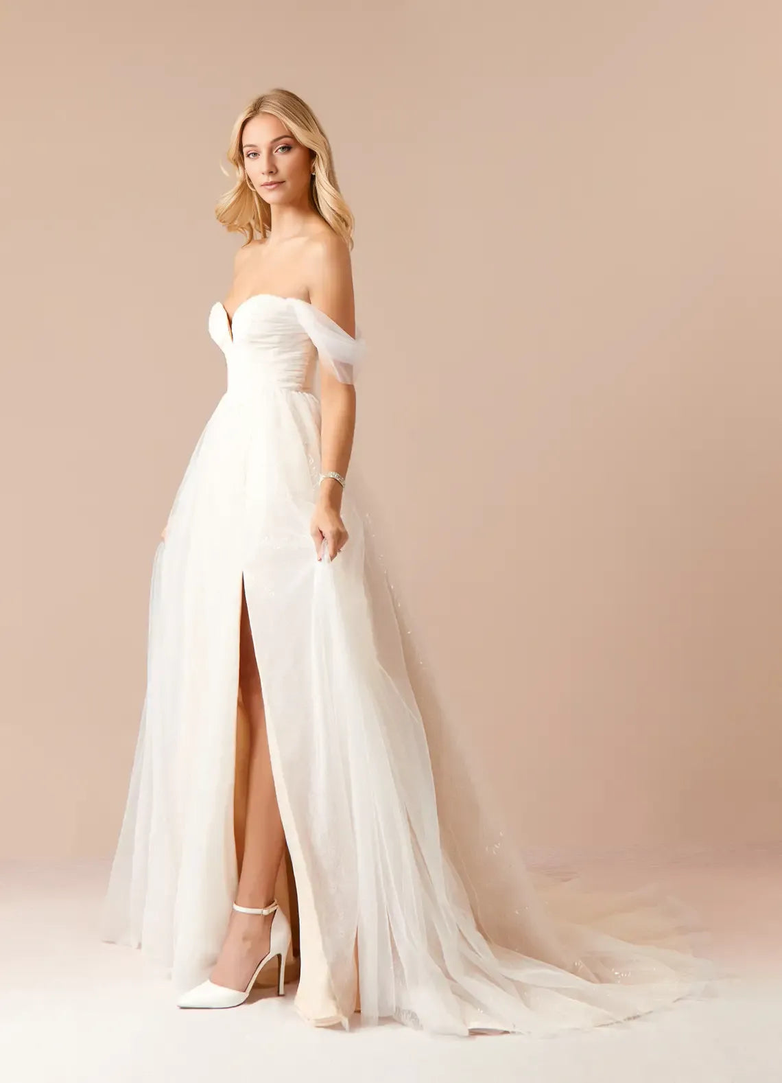 Champagne A-Line Off the Shoulder Sweetheart Neckline Wedding Dress with Sheer Skirt Side Slit, and Detailing for a Romantic Bridal Look