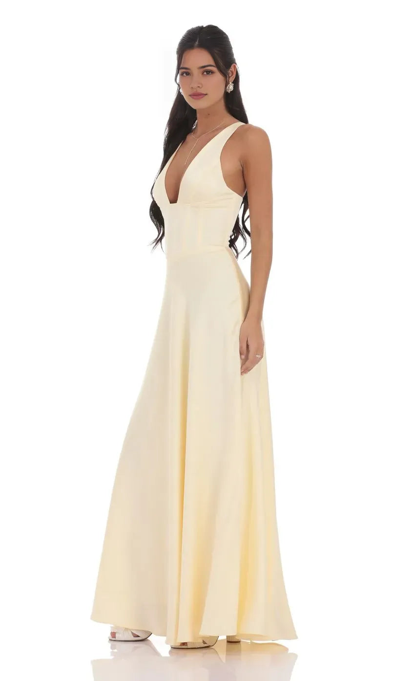 Black Cream Prom Dress with Plunging V - Neck Structured Corset Bodice and Flowy Skirt Ideal for Tie Proms