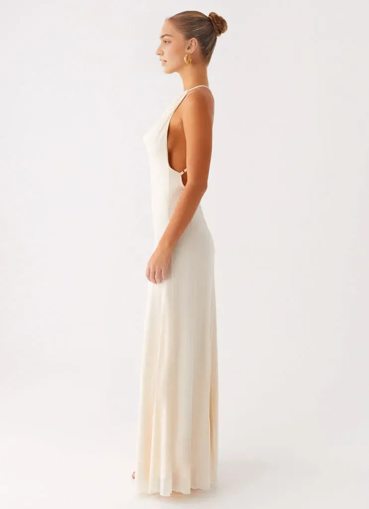 Ivory Prom Dress with Cowl Neckline Halter Straps Open Back and Floor-Length Silhouette for Formal Occasions
