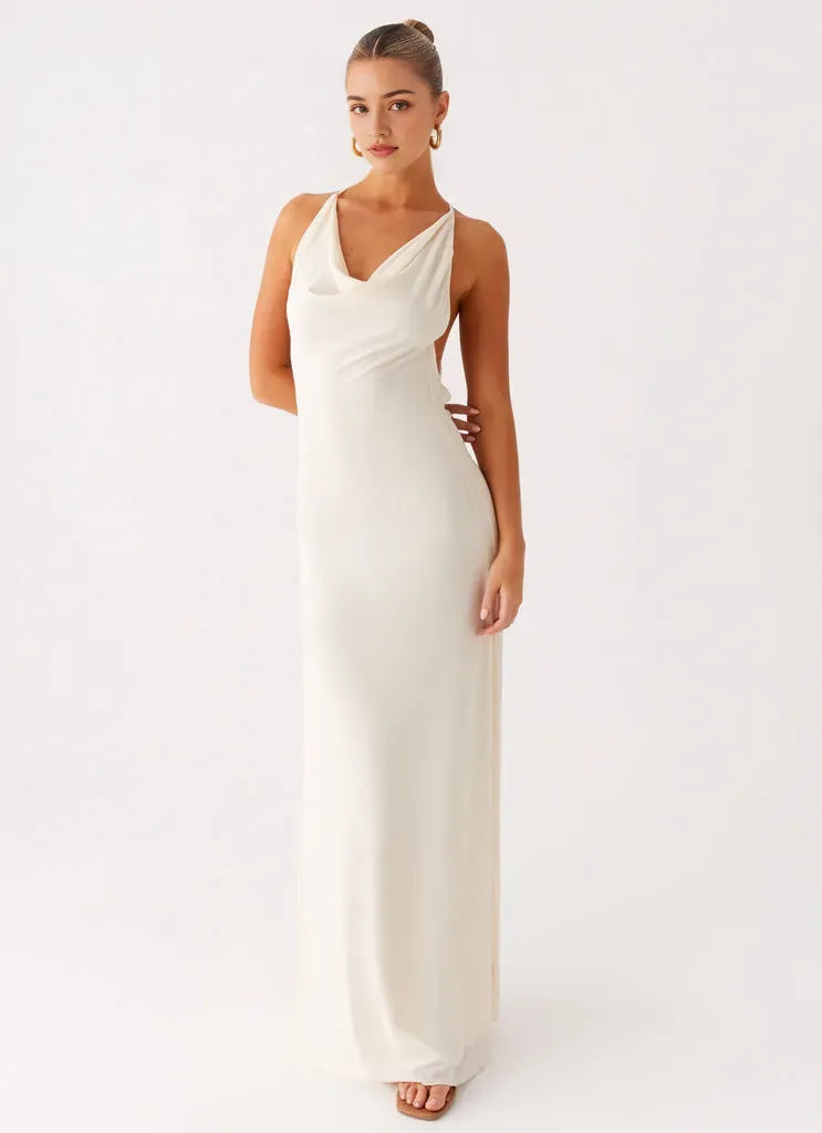 Ivory Prom Dress with Cowl Neckline Halter Straps Open Back and Floor-Length Silhouette for Formal Occasions