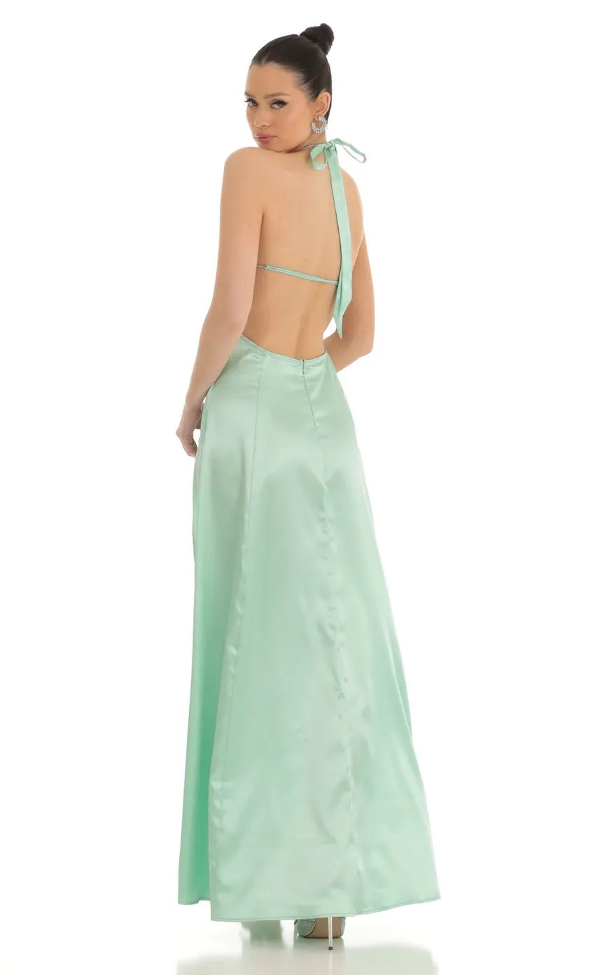 Green Mint Prom Gown featuring Halter Neckline Side Slits and Back Bow Accent to Elevate Your Prom Night