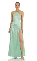 Green Mint Prom Gown featuring Halter Neckline Side Slits and Back Bow Accent to Elevate Your Prom Night