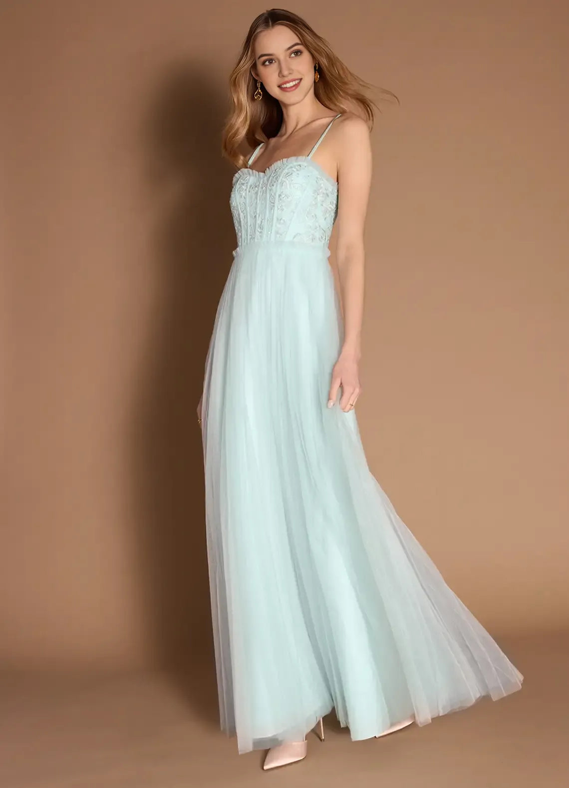 Green Mint Prom Dress with Spaghetti Straps Bodice and Flowy Skirt for Formal Occasions