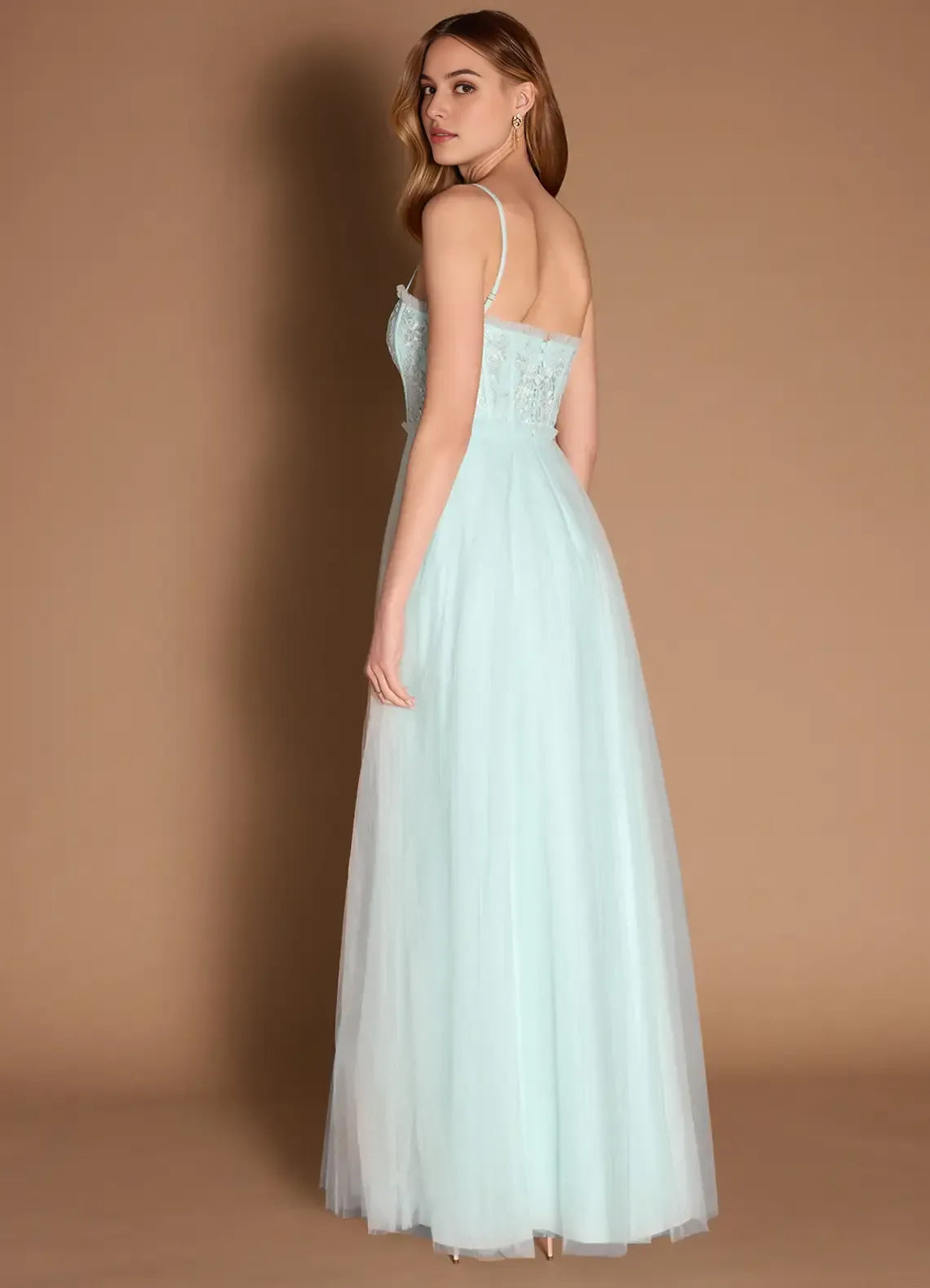Green Mint Prom Dress with Spaghetti Straps Bodice and Flowy Skirt for Formal Occasions