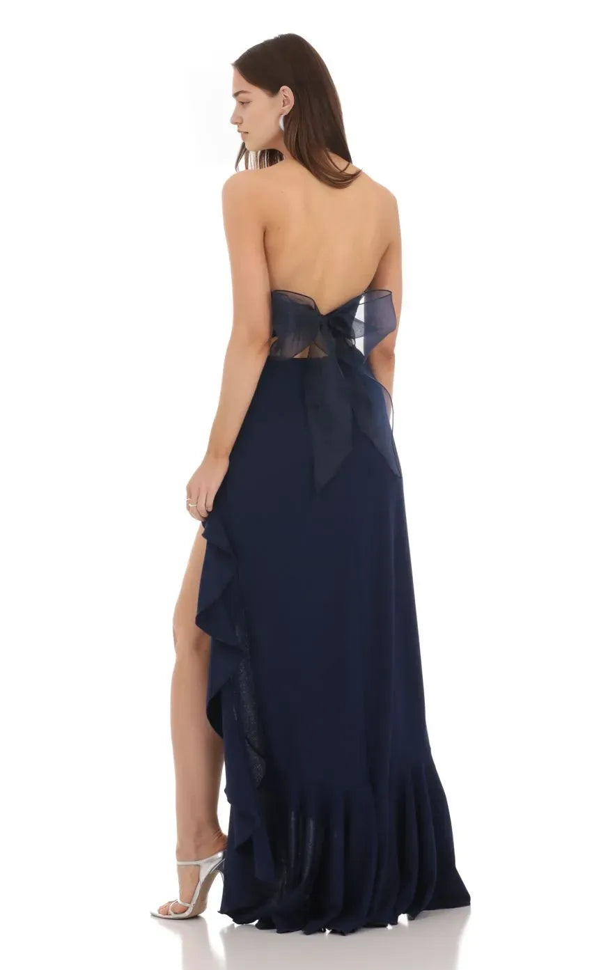 Navy Blue Strapless Prom Dress with Asymmetric Ruffled Slit and Bow Accent Perfect for Formal Galas and Prom Nights