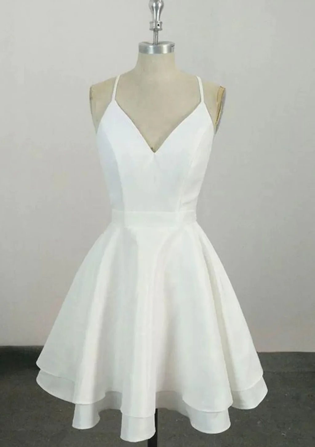 White Homecoming Dress with Spaghetti Straps Deep V Neckline and Layered Flared Skirt for Timeless Grace at School Reunions