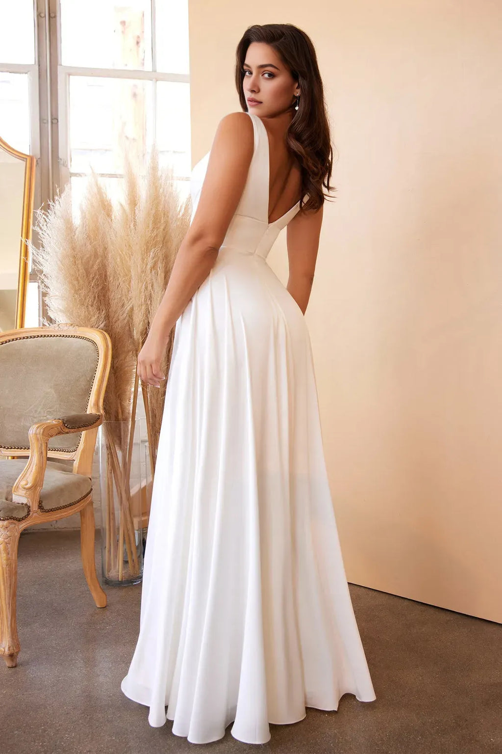 White Prom Dress with Deep V - Neck Pleated Bodice Flowy Skirt and High Side Slit for Formal Occasions