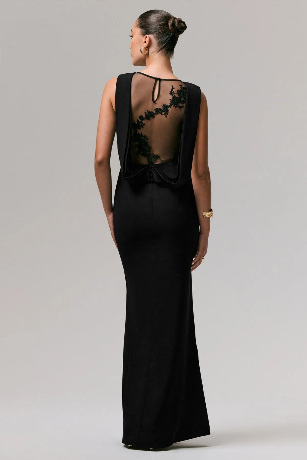 Black Enchanted Mermaid Gown with Sheer Back Artistic Drape forTimeless Events