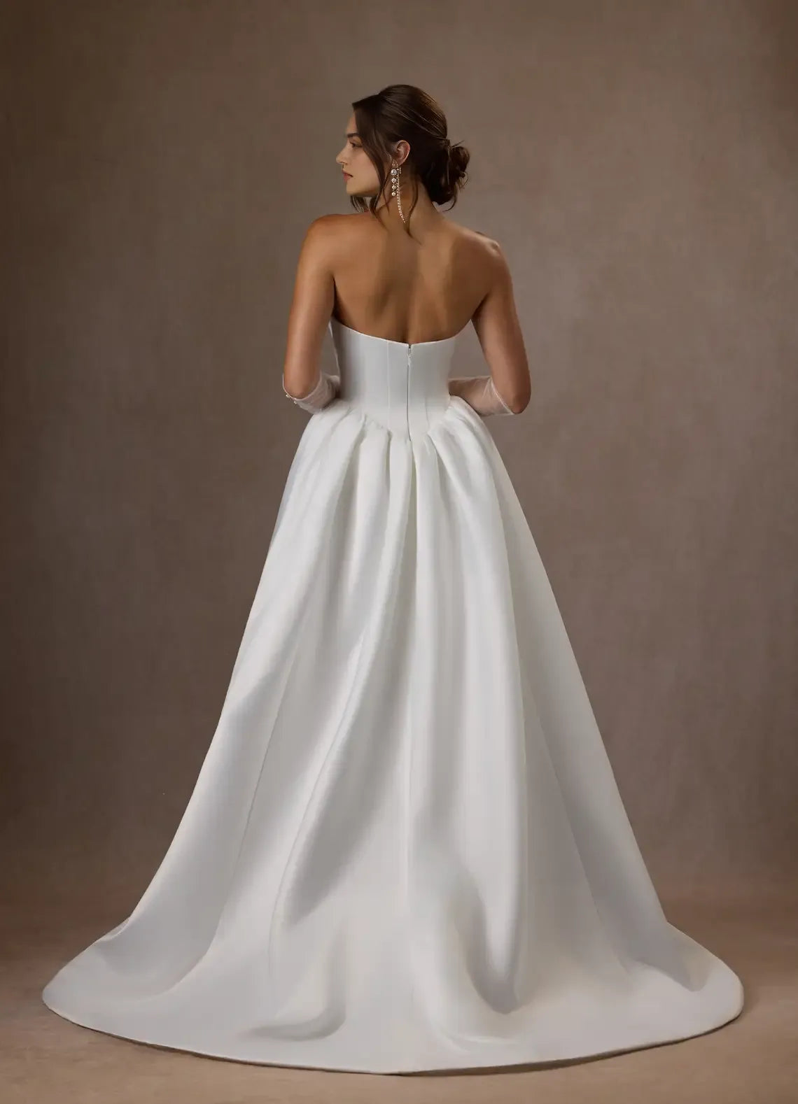 Formal Minimalist Strapless Wedding Dress Ball Gown Structured Bodice Voluminous Skirt Train Perfect for Timeless Elegant Weddings