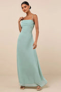Green Mint Prom Dresses featuring Spaghetti Straps Draped Bodice Detail and Flowing Floor Length Silhouette Perfect for Prom Nights