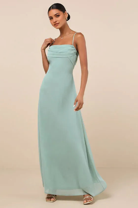 Green Mint Prom Dresses featuring Spaghetti Straps Draped Bodice Detail and Flowing Floor Length Silhouette Perfect for Prom Nights