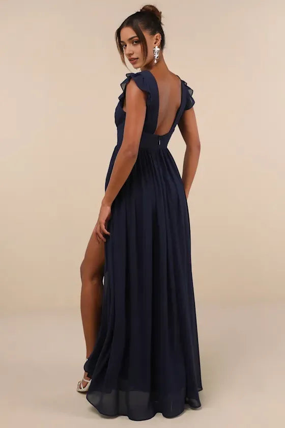 Navy Blue Prom Dresses featuring Flutter Sleeves Surplice V -Neckline Ruched Empire Waist and High - Slit Skirt Perfect for Prom Nights