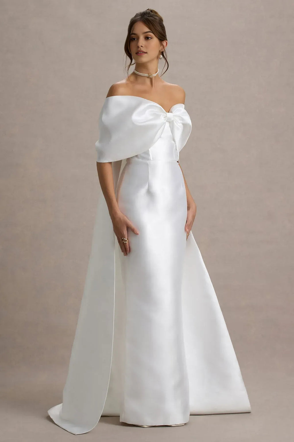 White Off - Shoulder Prom Dress with Bow Accent and Dramatic Train for Formal Galas