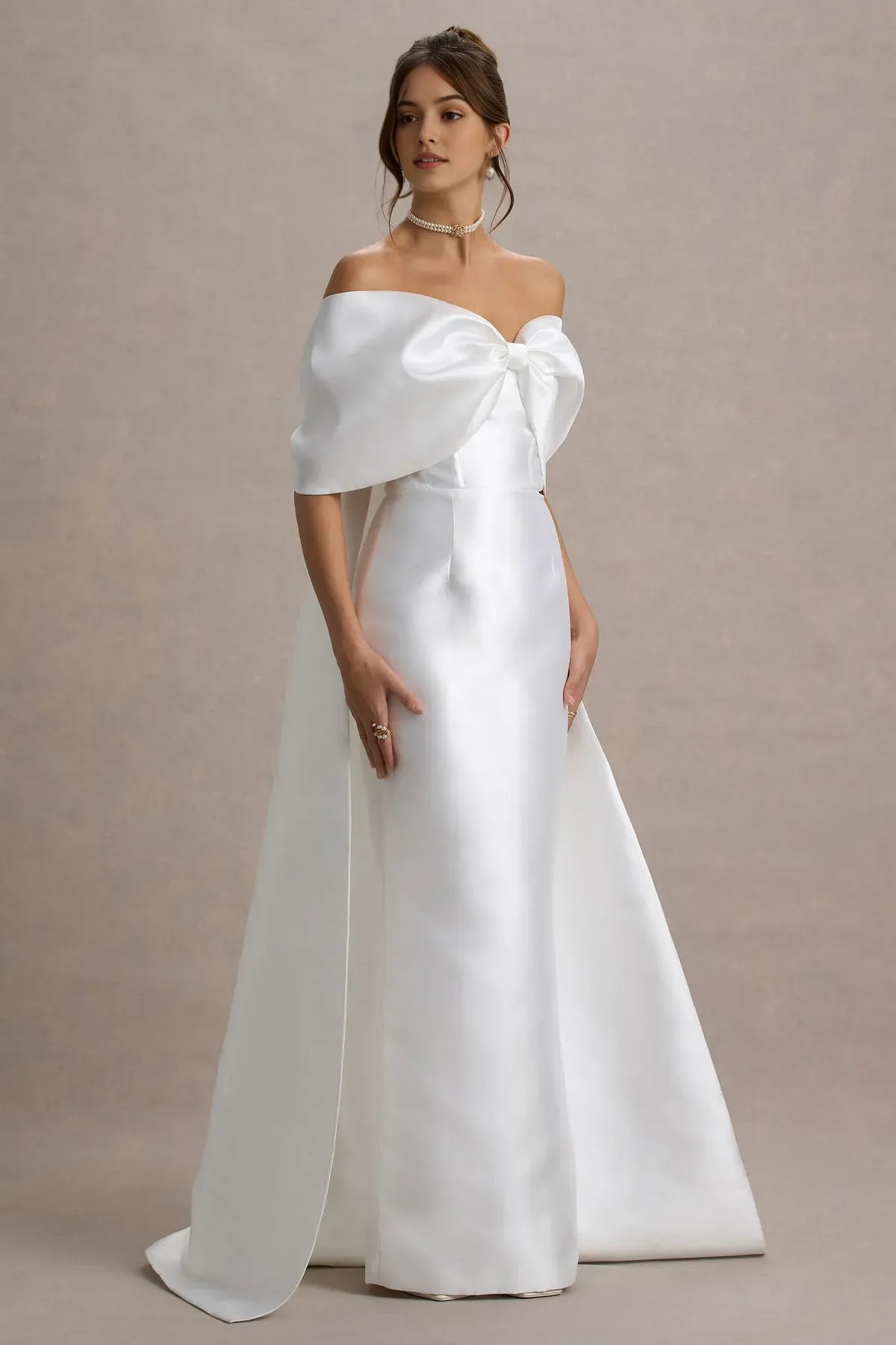 White Off - Shoulder Prom Dress with Bow Accent and Dramatic Train for Formal Galas