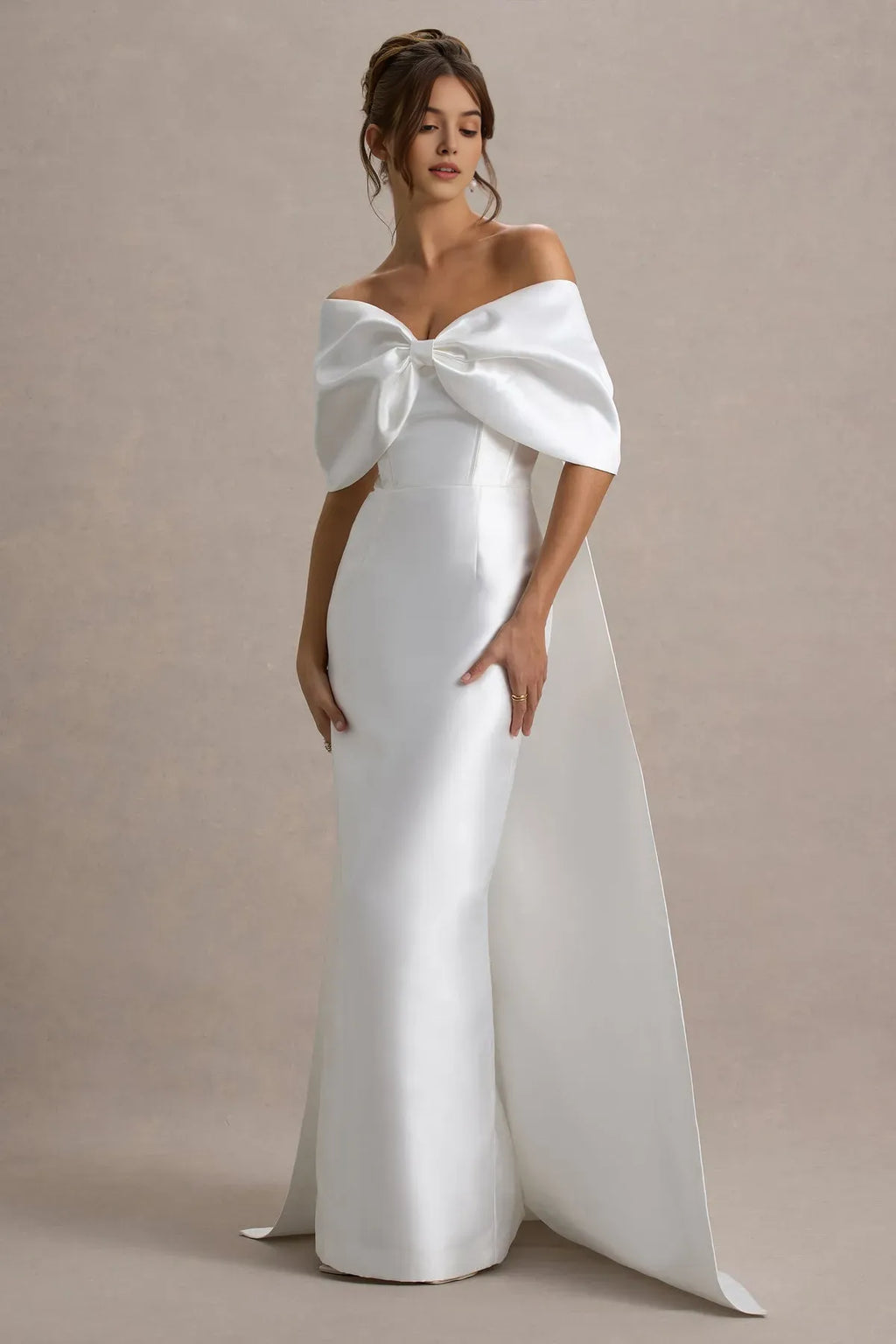 White Off - Shoulder Prom Dress with Bow Accent and Dramatic Train for Formal Galas