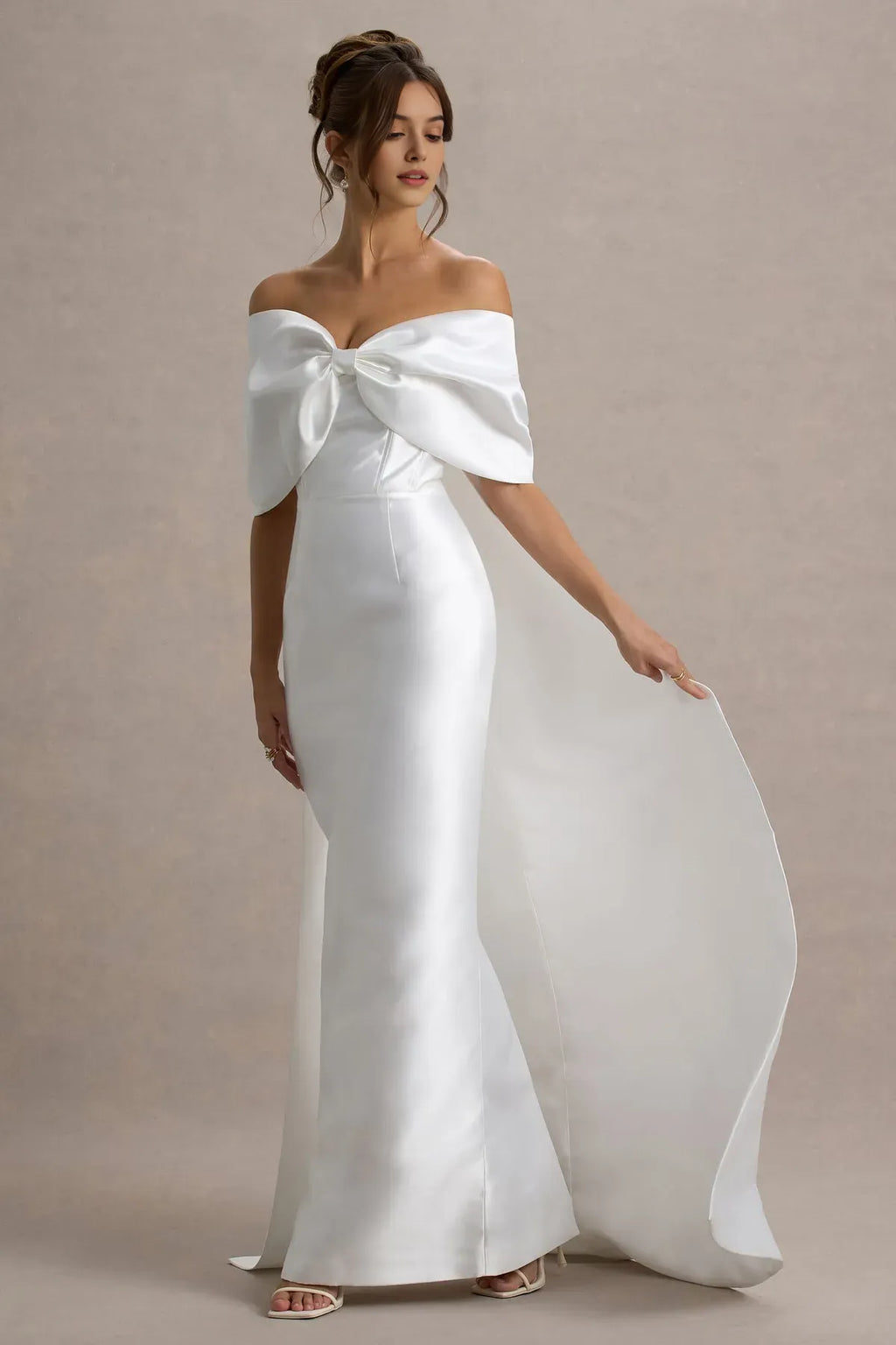 White Off - Shoulder Prom Dress with Bow Accent and Dramatic Train for Formal Galas