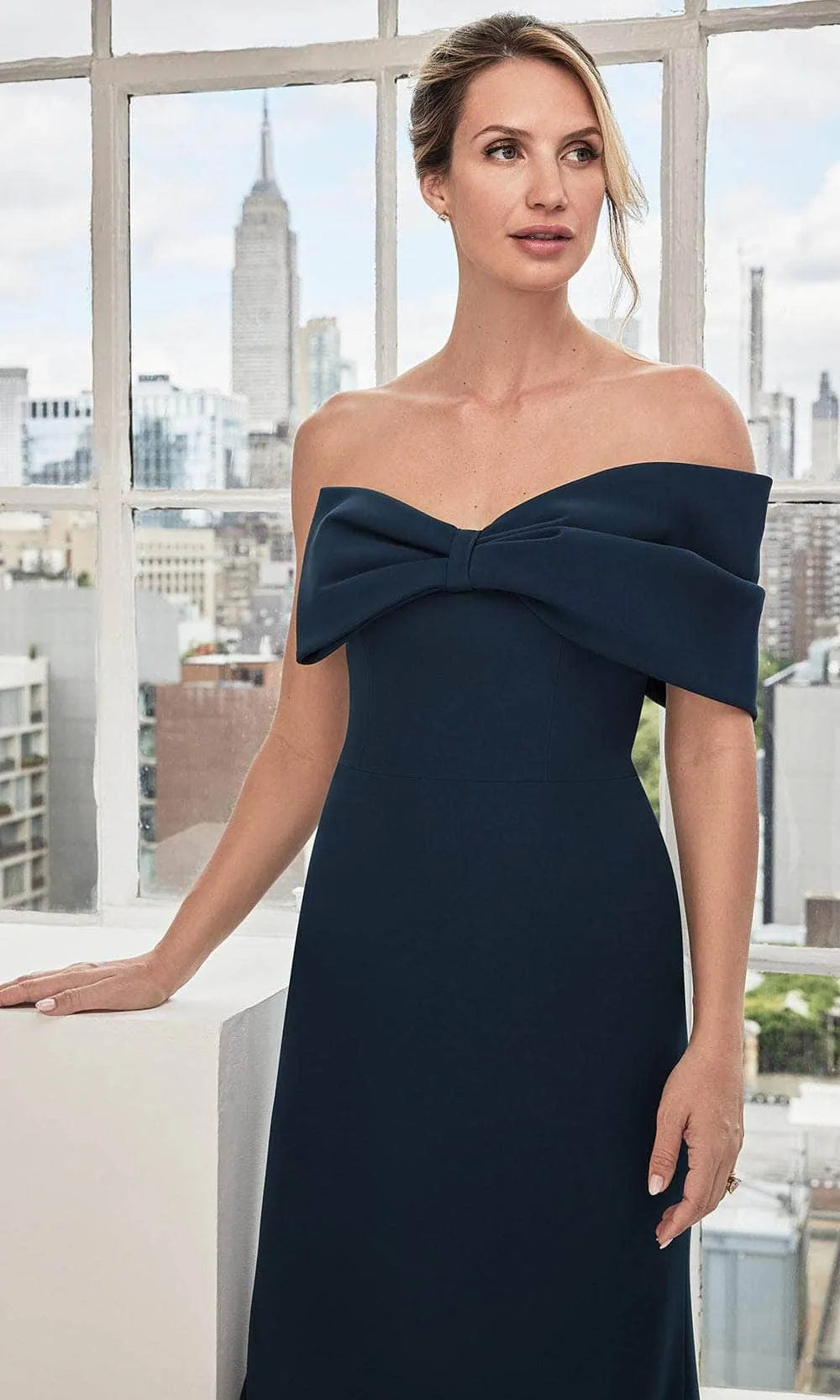Navy Blue Strapless Evening Gown with Bow Front Detail Form Fitting Mermaid Silhouette and Structured Bodice for Formal Galas Black Tie Weddings and City Chic Events