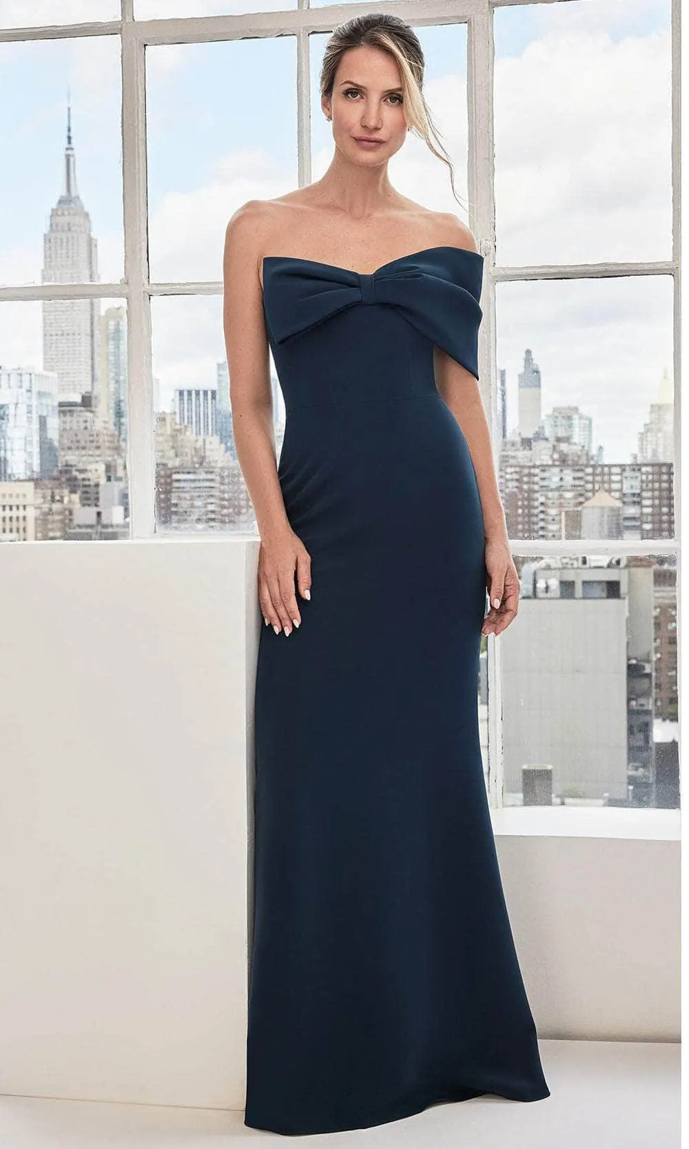 Navy Blue Strapless Evening Gown with Bow Front Detail Form Fitting Mermaid Silhouette and Structured Bodice for Formal Galas Black Tie Weddings and City Chic Events