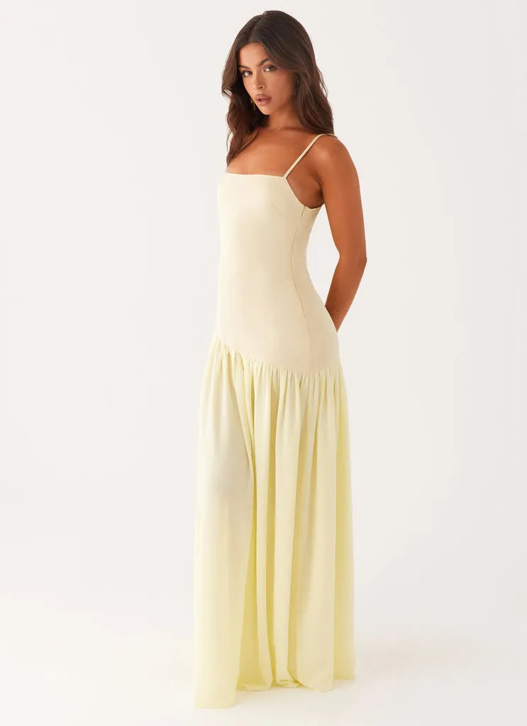 Yellow Pale Prom Dress with Square Neckline Spaghetti Straps Asymmetric Ruffle Hem Fitted Bodice Perfect for Formal Galas