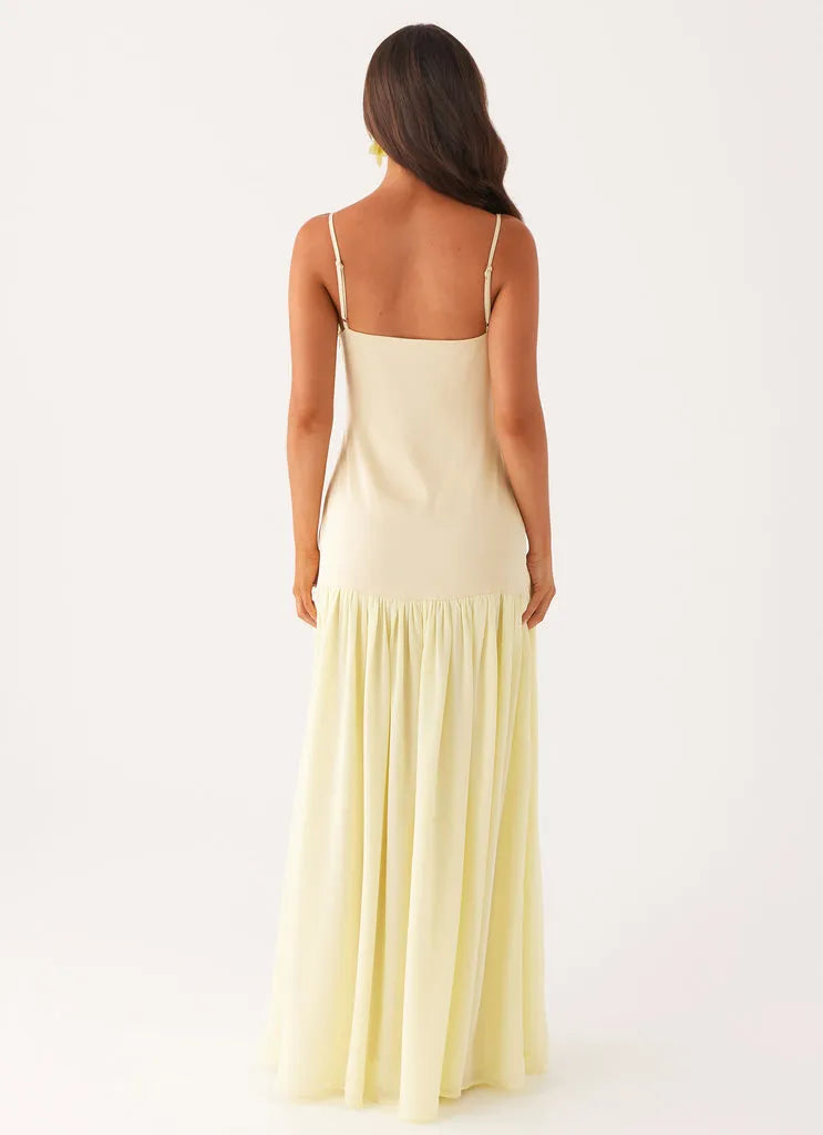 Yellow Pale Prom Dress with Square Neckline Spaghetti Straps Asymmetric Ruffle Hem Fitted Bodice Perfect for Formal Galas