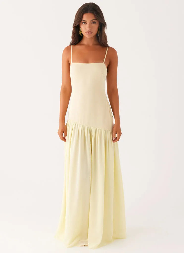 Yellow Pale Prom Dress with Square Neckline Spaghetti Straps Asymmetric Ruffle Hem Fitted Bodice Perfect for Formal Galas