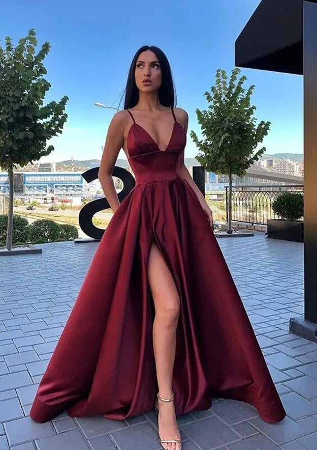 Burgundy Romantic Prom Dress with Deep V - Neck Spaghetti Straps and Flowy Skirt