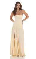 Strapless Beige Prom Dress with Ruched Bodice Pleated Skirt and Flattering Fit Designed for Elegant Prom Celebrations