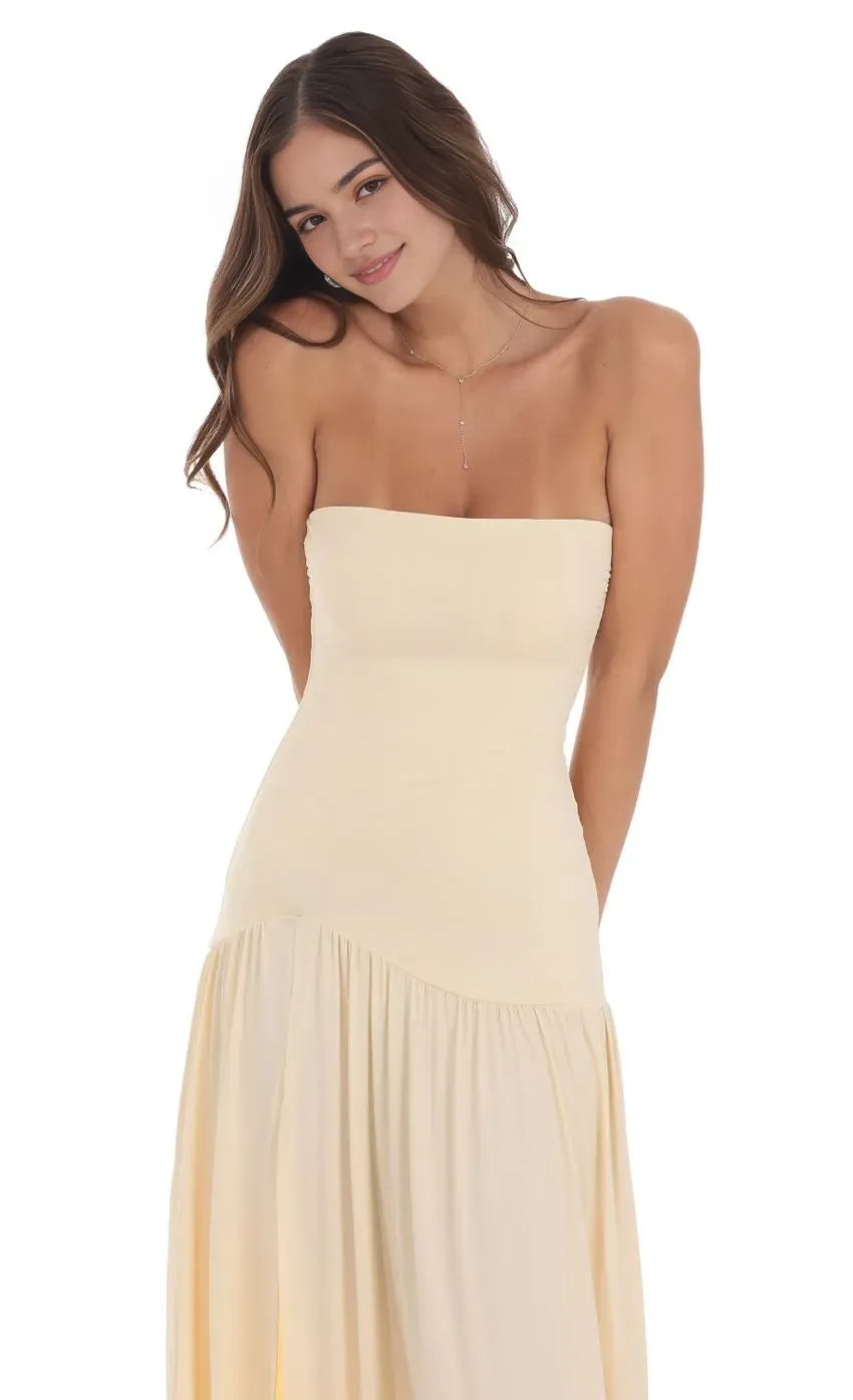Strapless Beige Prom Dress with Ruched Bodice Pleated Skirt and Flattering Fit Designed for Elegant Prom Celebrations