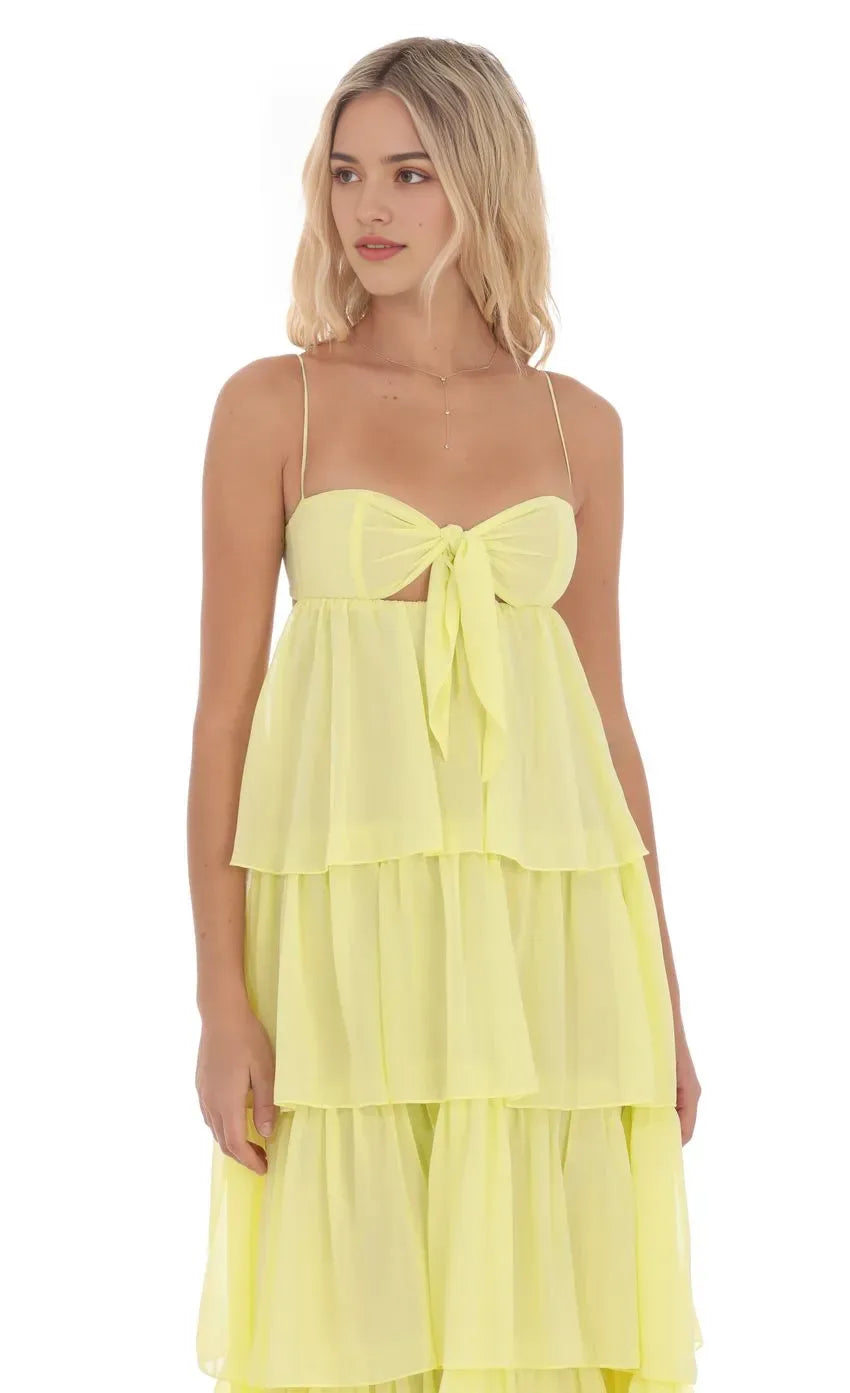 Yellow Neon Yellow Prom Gown with Spaghetti Straps Bow Cutout Tie Ruffle Skirt Suited for Memorable Prom Nights