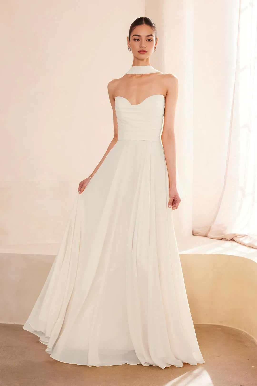 Ivory Strapless Prom Dress with Ruched Bodice and Flowing Skirt
