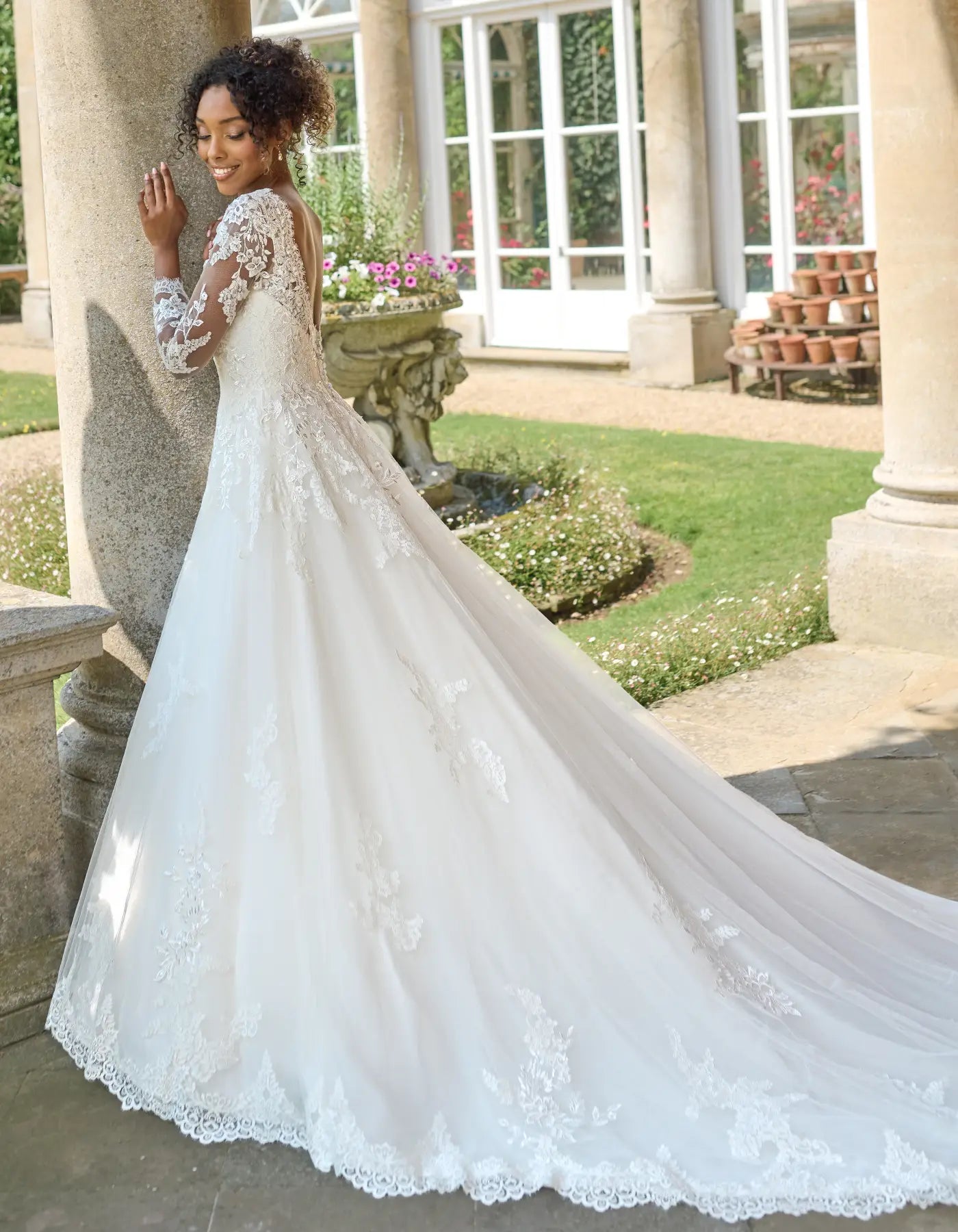 a traditional gown with sleeves
