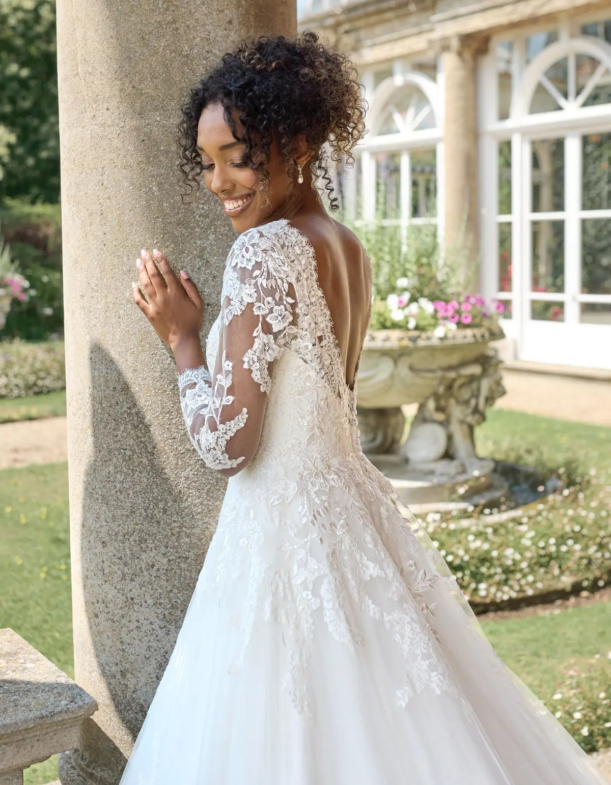 a traditional gown with sleeves
