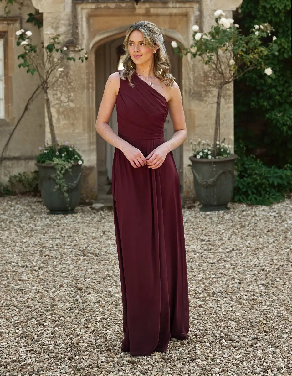 this elegant one-shoulder draped dress is cool & contemporary