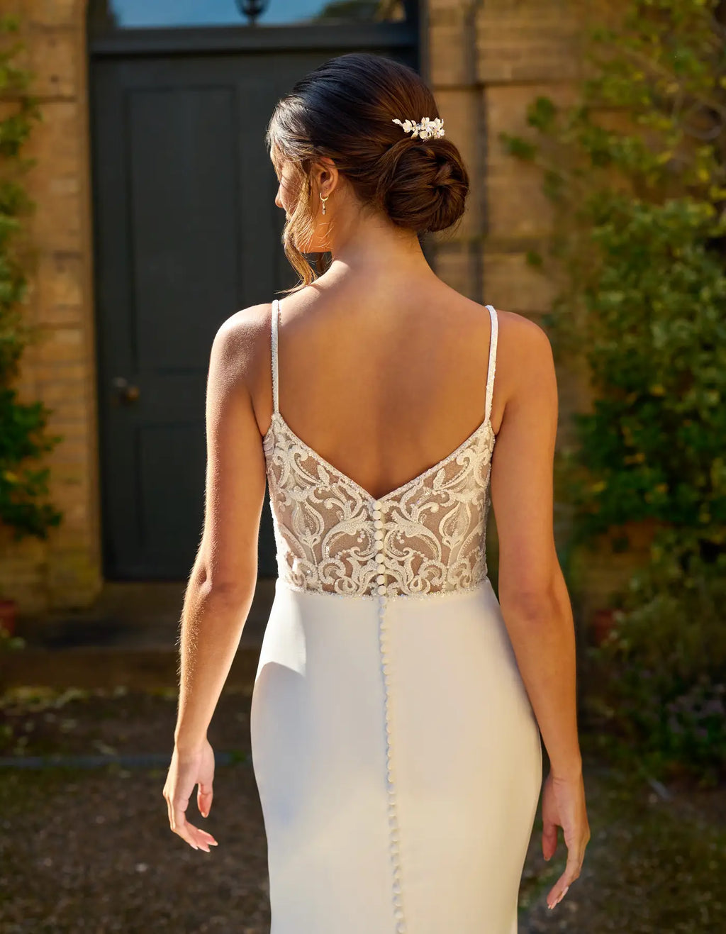 a wedding dress with illusion back