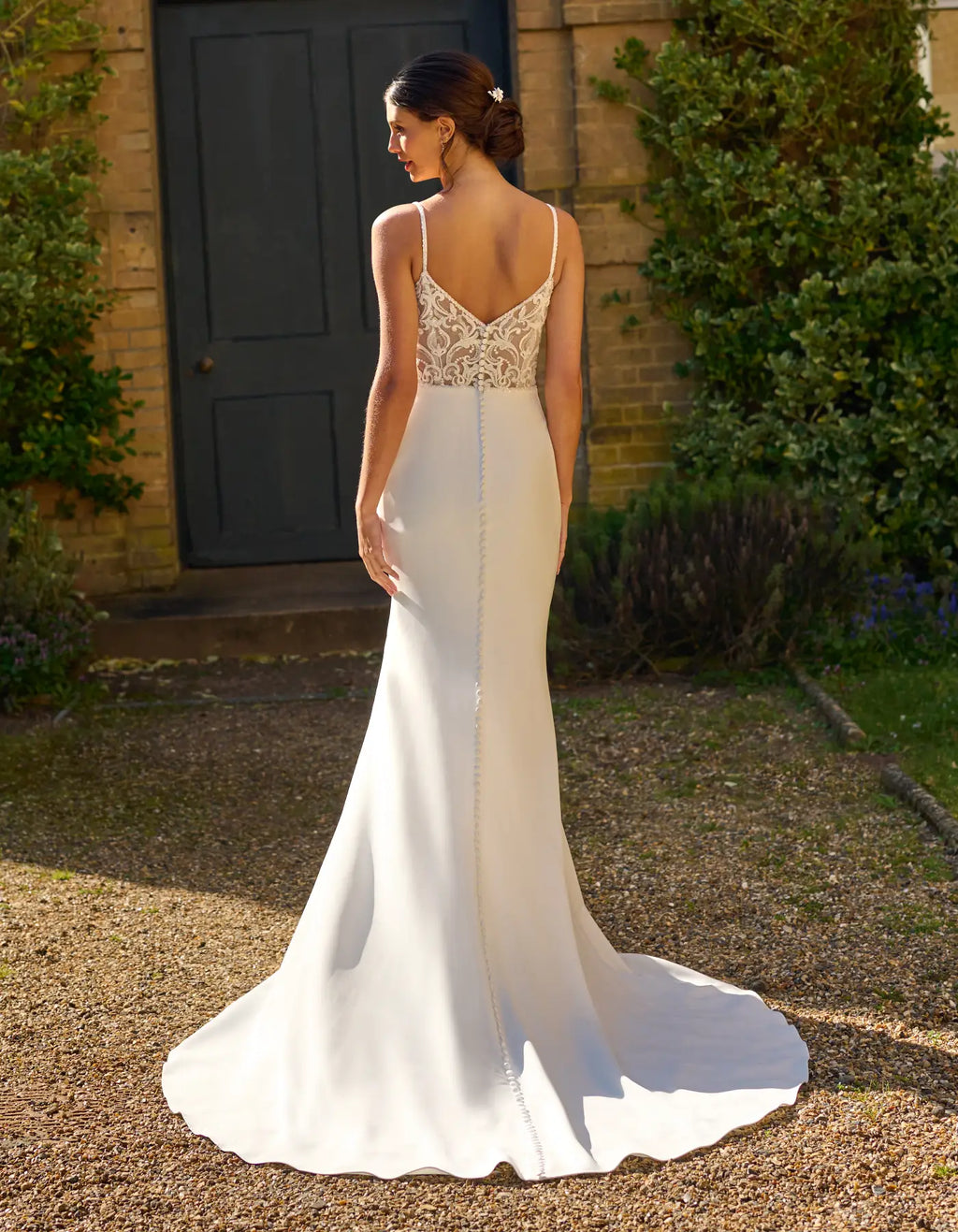 a wedding dress with illusion back