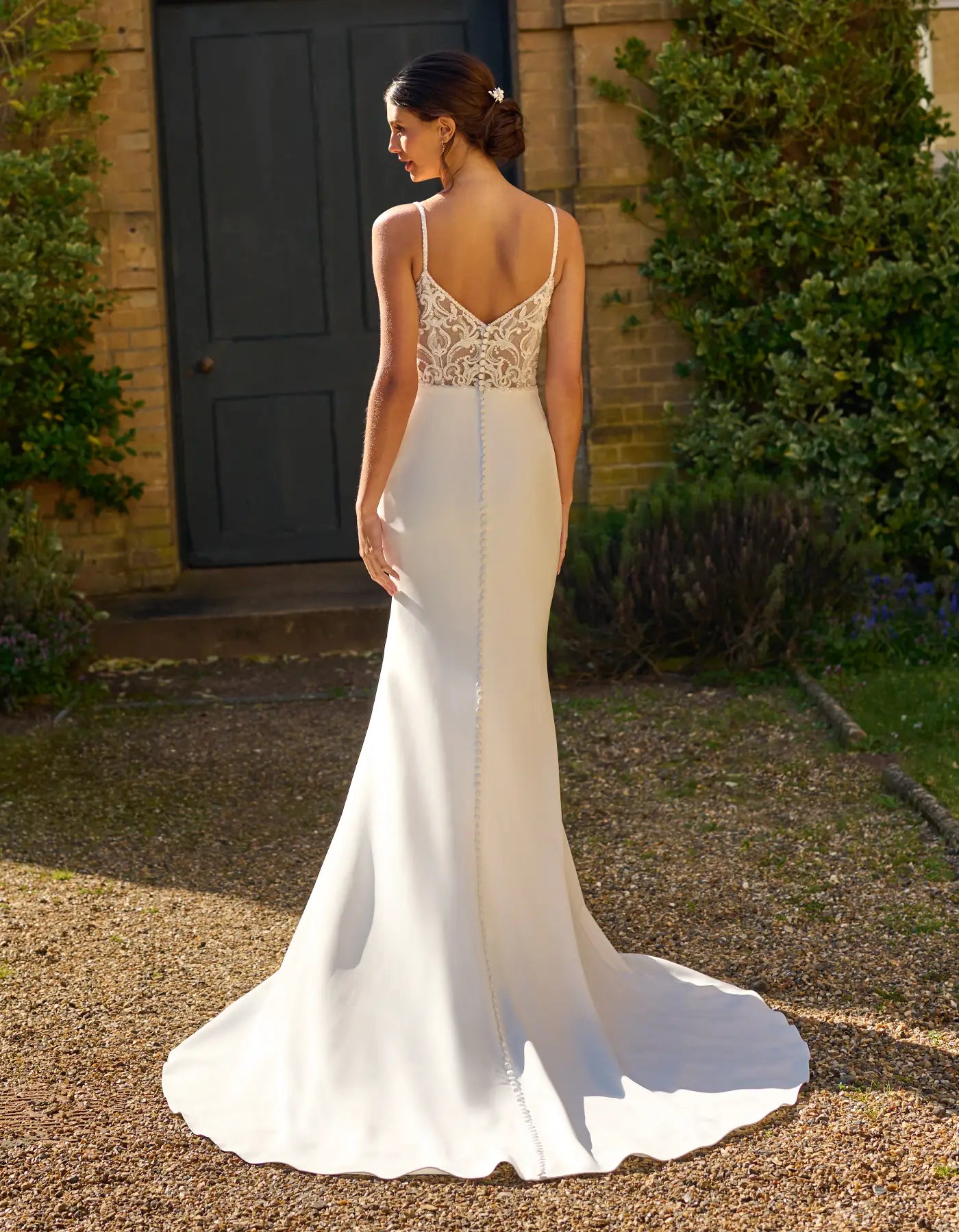 a wedding dress with illusion back