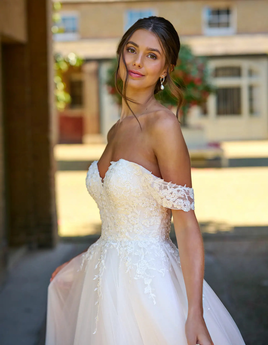 an off-the-shoulder a-line