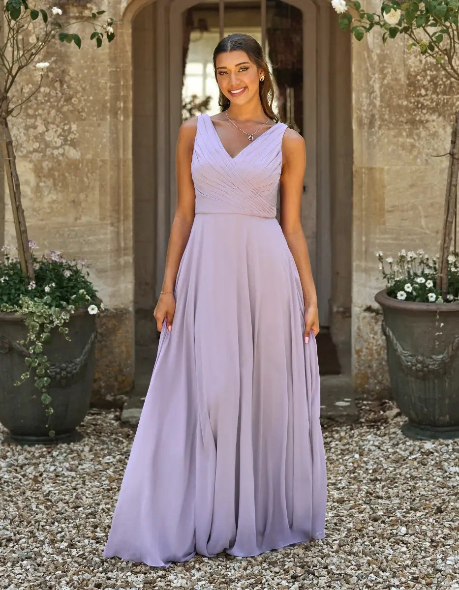 a gorgeous pleated bodice with an unexpected romantic cowl back