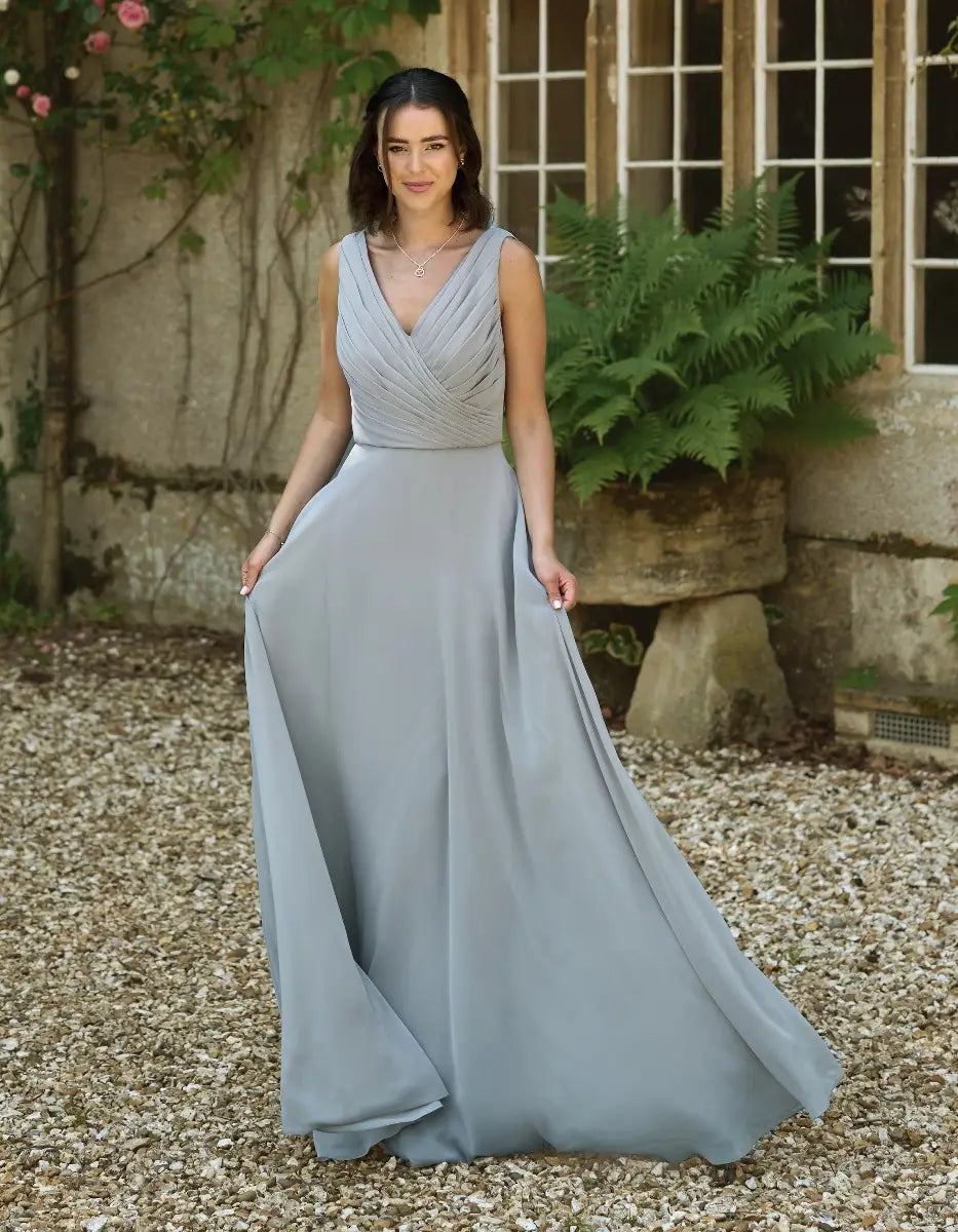 a gorgeous pleated bodice with an unexpected romantic cowl back
