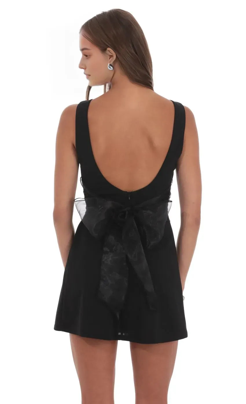 Black leek Sleeveless Homecoming Dress Boat Neckline Side Cut Out Detail A Minimalist Chic Must Have for Trendy School Dances