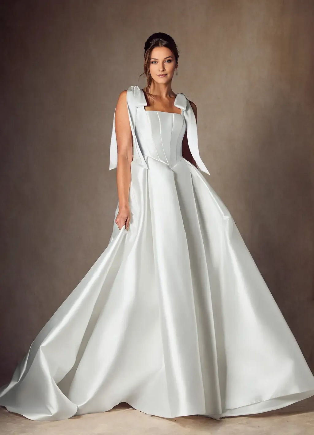 legant Ball Gown Wedding Dress with Square Neckline Bow - Accented Straps and Structured Corset Bodice for Timeless Bridal Glamour