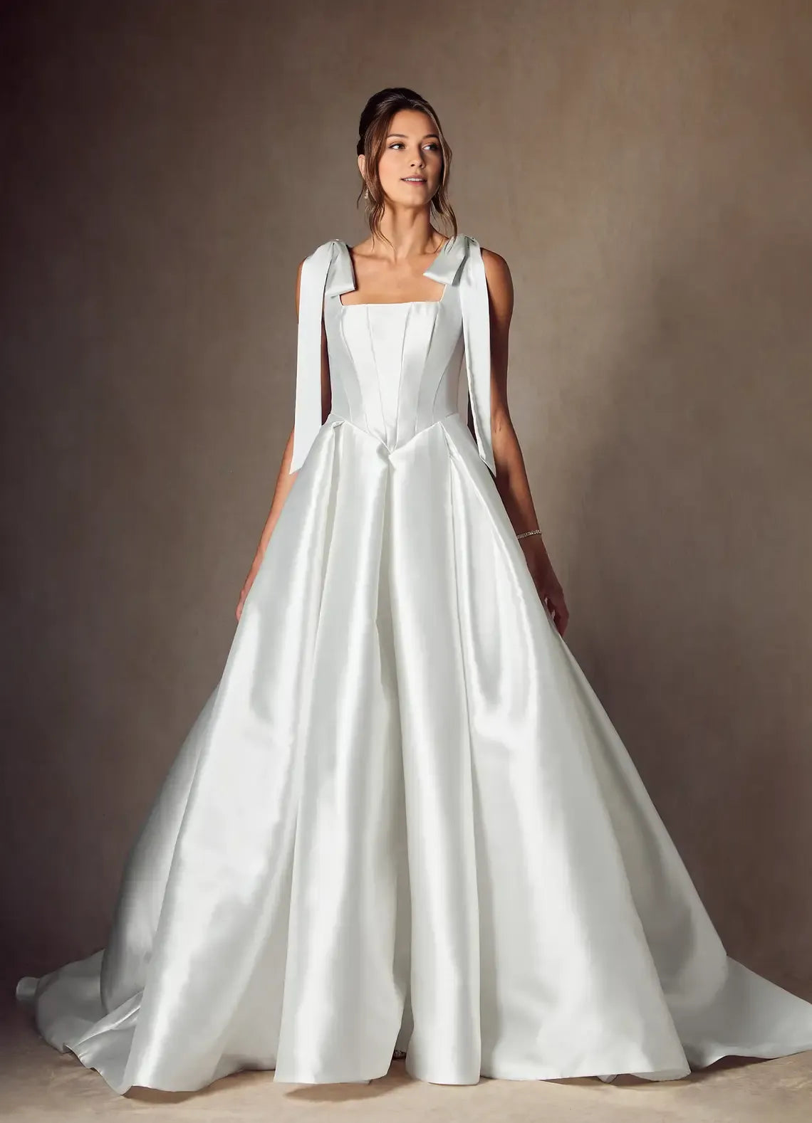 legant Ball Gown Wedding Dress with Square Neckline Bow - Accented Straps and Structured Corset Bodice for Timeless Bridal Glamour