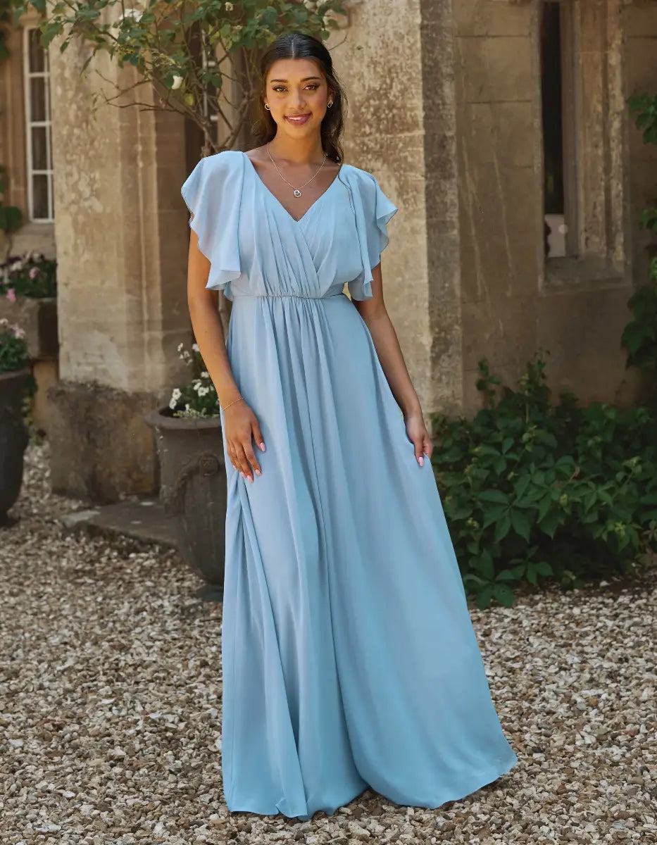 a modern draped bodice with lightweight angel sleeves